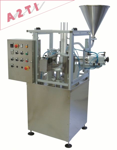 Operculeuse + doseuses automatiques rotatives Operculeuse + doseuses automatiques rotatives